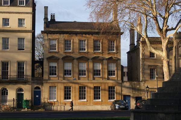 External image of 37a St Giles building with tree and sunshine